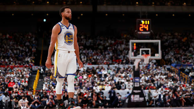 Oct 2, 2022; Saitama, JPN; Golden State Warriors guard Stephen Curry (30) reacts reacts against the Washington Wizards in a preseason game at Saitama Super Arena.